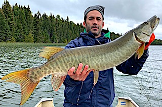 Pete Fishing for BIG Muskie at Fireside Lodge in Canada